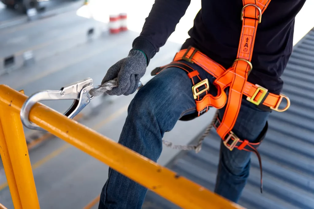 Commercial Roofing worker wearing Fall Safety gear