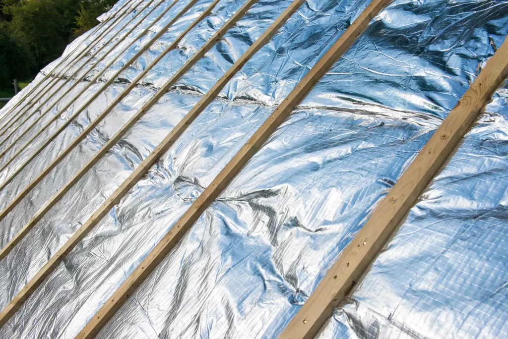 A roof with reflective insulation. Unlocking Top Energy-Efficient Insulation for Commercial Roofs with Preferred Roofing.
