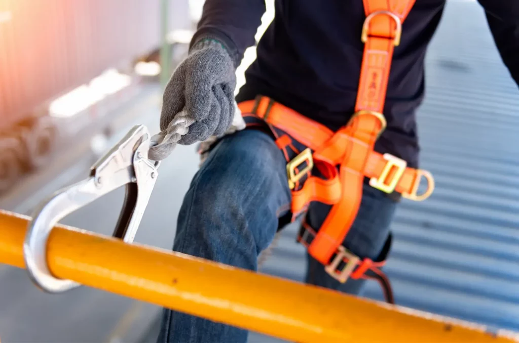 A closeup example of equipment used in roofing harness and anchor safety.