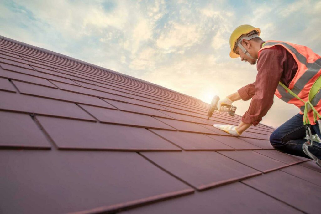 Commercial Flat Roof Repair. working on the roof