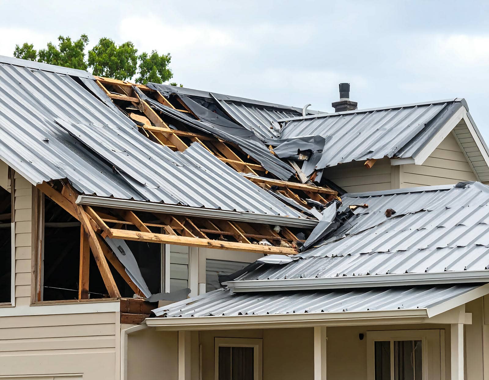 Severely damaged roof after storm