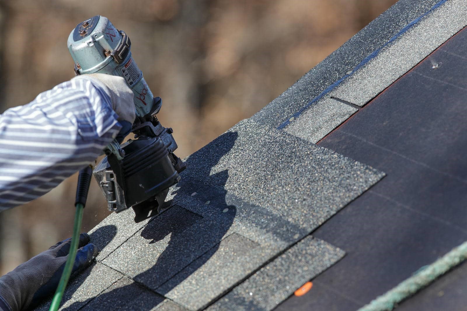Installing asphalt shingles on a roof